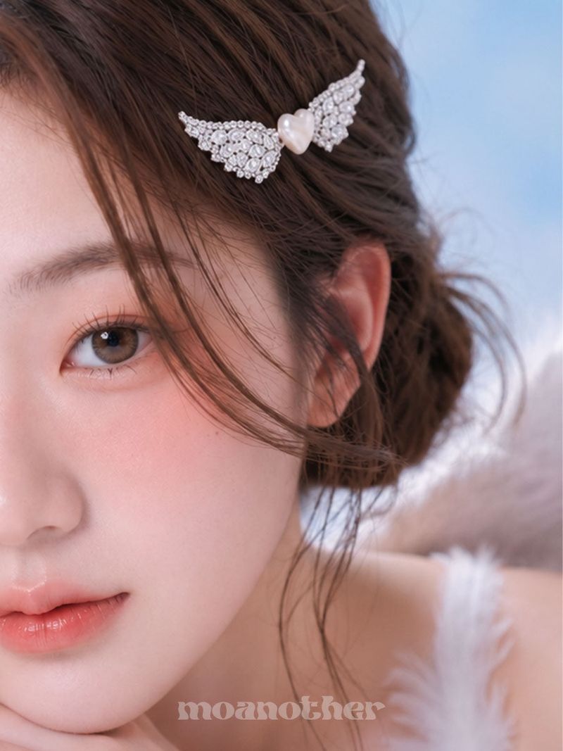 moanother（モノアザー）の「キューピッド ウィング ヘアピン（ヘアアクセサリー）」