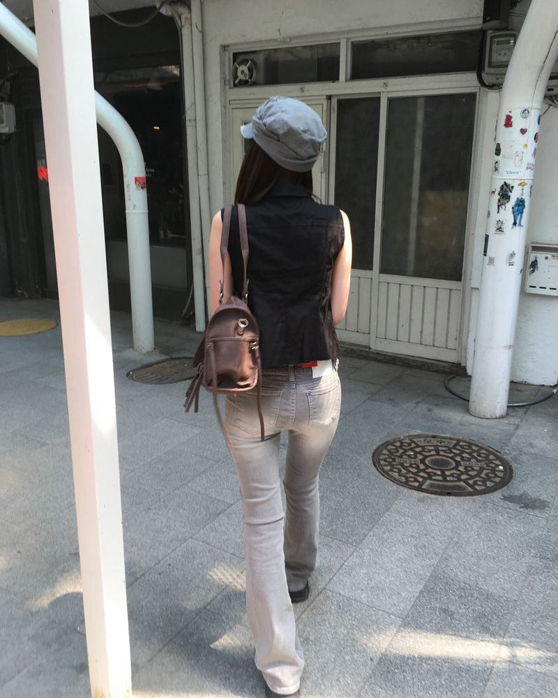 Grey lowrise boots cut pants