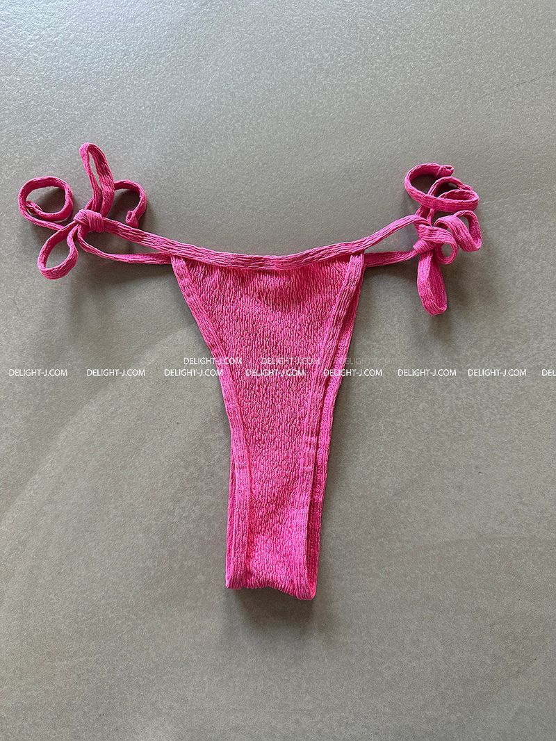 a set of 2 layered colored bikinis