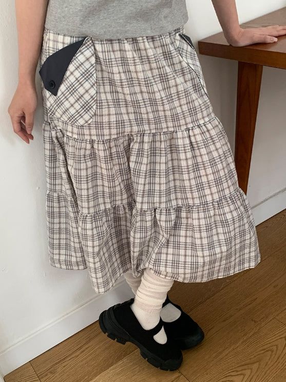 BAON（バオン）の「Shuning Check Pocket Midi Skirt（Skirts）」