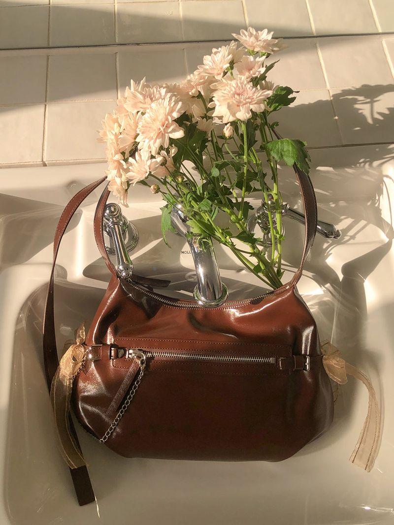 ovuni（オーブニ）の「Belted ribbon bag_chocolate brown（Bags）」