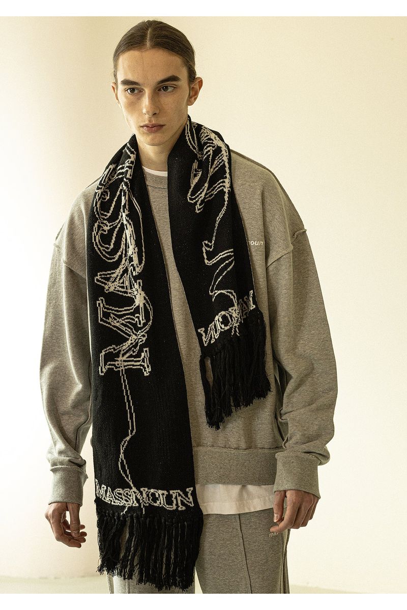 MASSNOUN(マスノウン)の「LETTERING TASSEL MUFFLER(Fashion Accessories)」