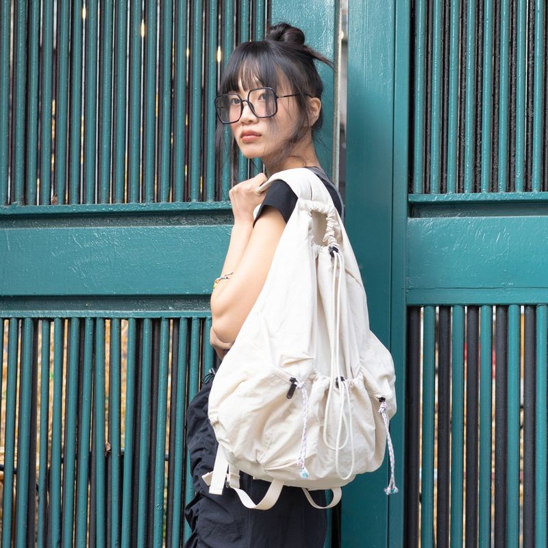 prends soin de toi(プレンズ ソン デ トイ)の「ドローストリングナイロンバックパック CREAM BEIGE(バッグ)」
