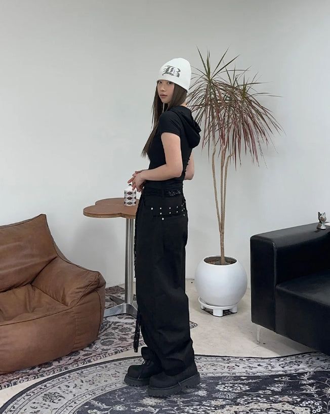Pale studded strap pants
