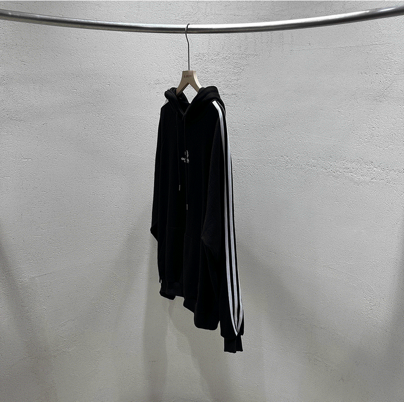 Outside track over hoodie
