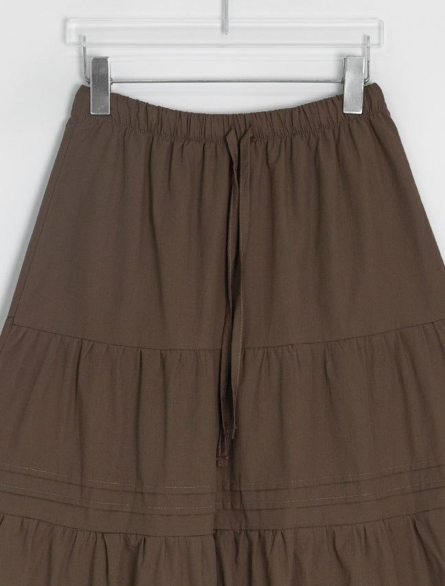 Nayuta Pintuck Tiered Banding Long Skirt