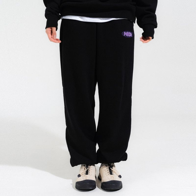 NEWKITSCH(ニューキッチジェネレーション)の「OVAL LOGO TRAINING PANTS-BLACK(Pants)」