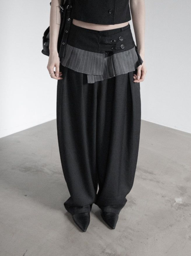 mnem（ムネム）の「Curved Balloon Pleated Wrap Slacks（Pants）」