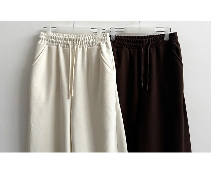 Mende Curved Incision Woolen Wide Pants