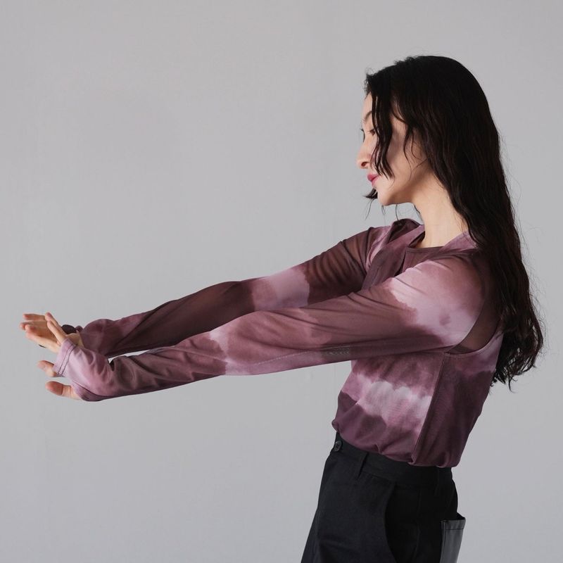 Uenui（ウニュイ）の「sheer marble layered tops（Tops）」