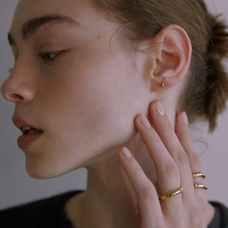 Third Movementの「Mini Melting Heart Earring (Gold)(Accessories)」
