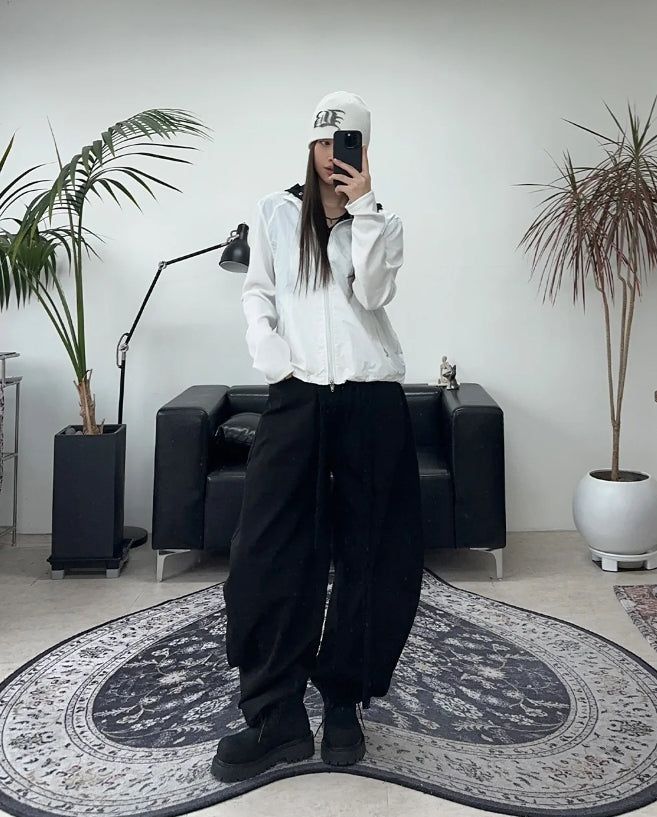 Pale studded strap pants