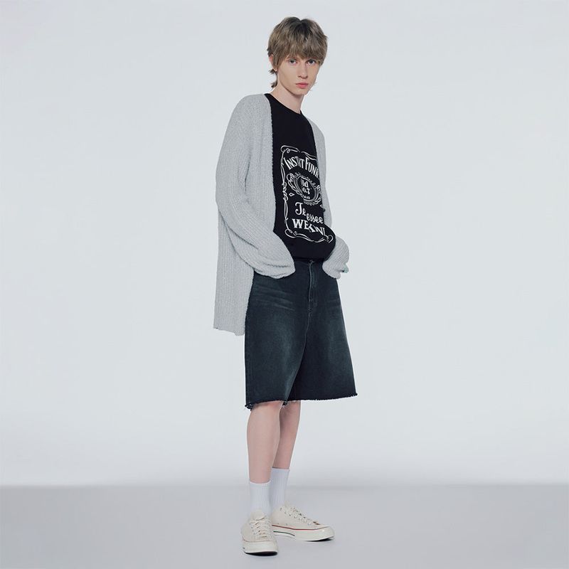 Distressed dequinned-knit cardigan
