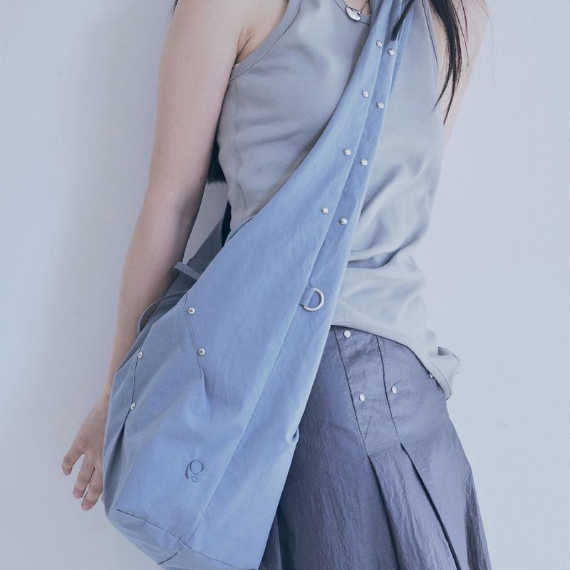 poie(ポイエ)の「rivet cross bag (blue green)(Bags)」