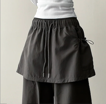 Log banding layered pocket skirt pants