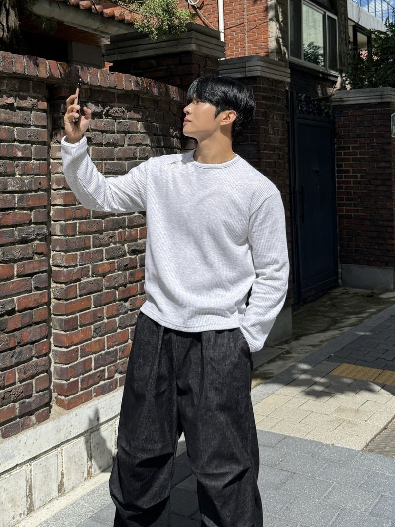 AVAND（アバンド）の「ワッフルダイアゴナルボタンクロップロングスリーブTシャツ（トップス）」