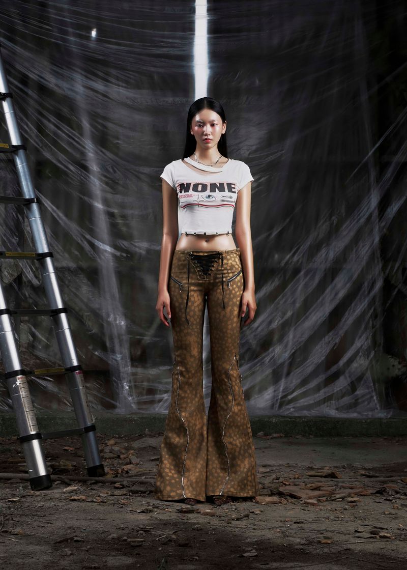 TATICHU（タティチュ）の「NONE Printed Lace Up Flared Jean（Pants）」