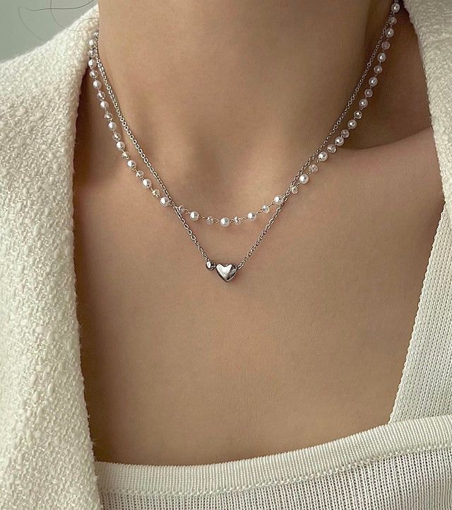 Acer rojo(アセルロジョ)の「tyu Pearl Beads Heart Ball Scenic Steel Titan Choker Short Layered Guest Necklace(Accessories)」