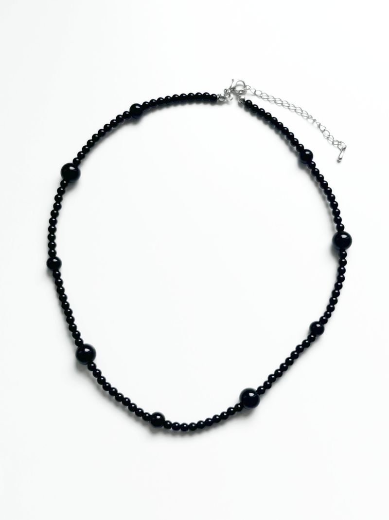 Poco pelota necklace