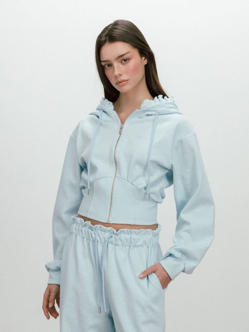 MOIFAIRE（モイフェア）の「BAKE HOODIE ZIP-UP / SKYBLUE（Tops）」
