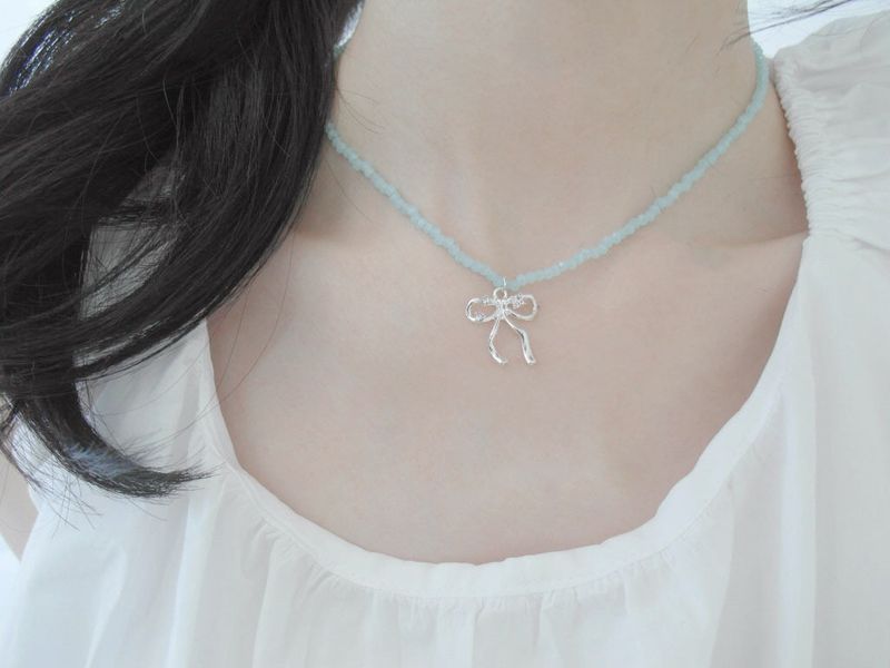 aoyu（アオユ）の「Ribbon beaded necklace （Fashion Accessories）」