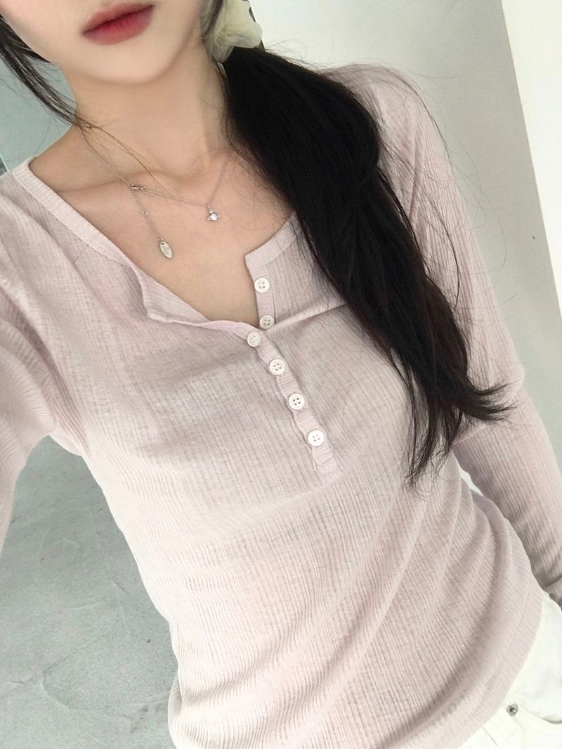 Kitten（キッテン）の「ボタン長袖Tシャツ (2 colors)（トップス）」
