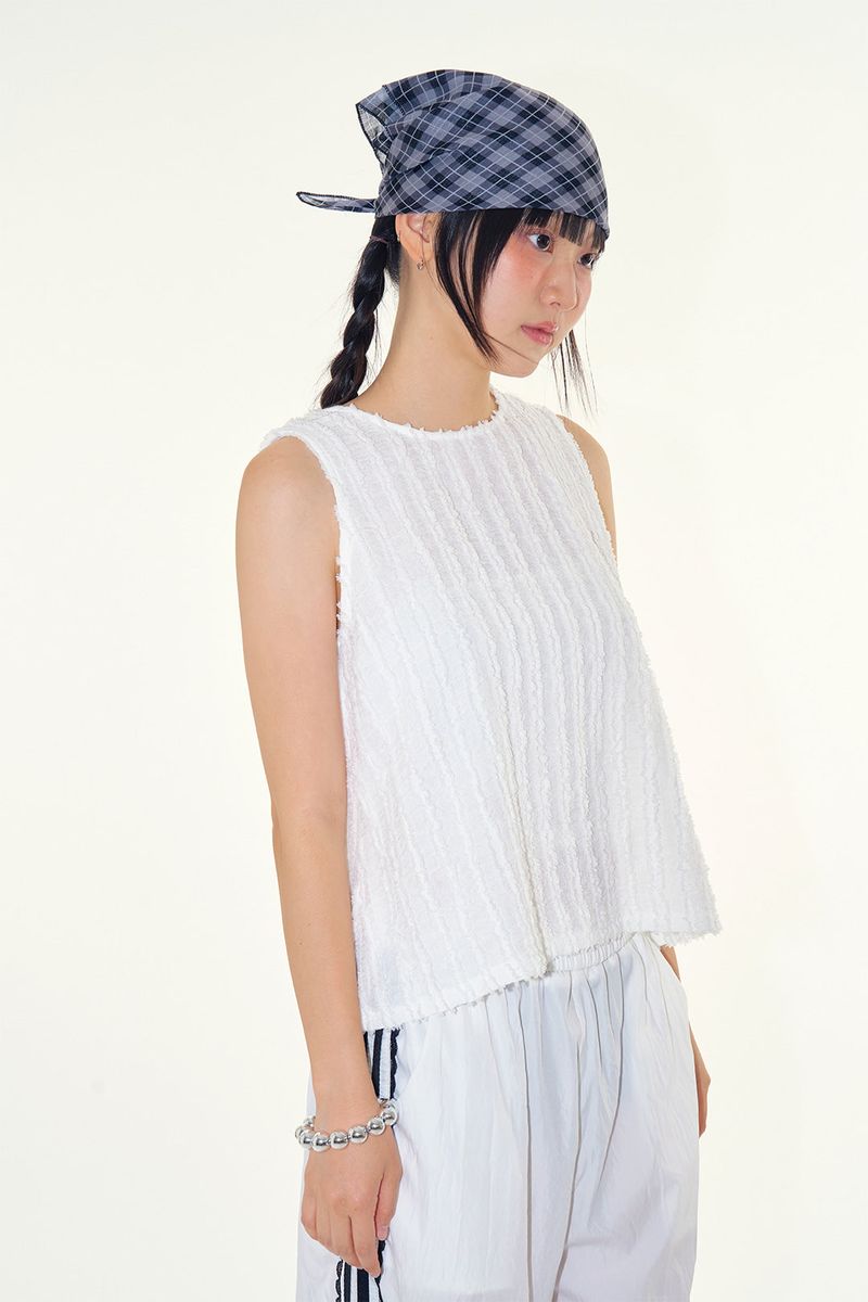 Raucohouse（ラウコハウス）の「Back ribbon sheer sleeveless（Tops）」