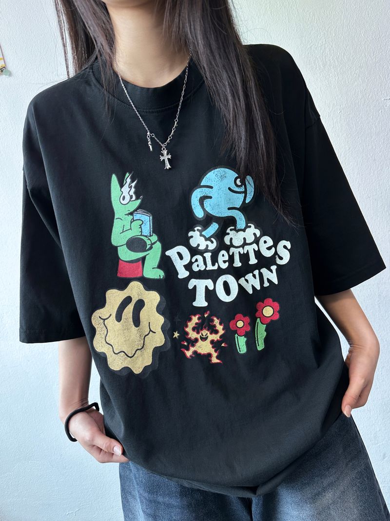 CCORTTI(コルッティ)の「Cakey Cartoon Graphic Pigment Patch Oversized Tee 2color(Tops)」