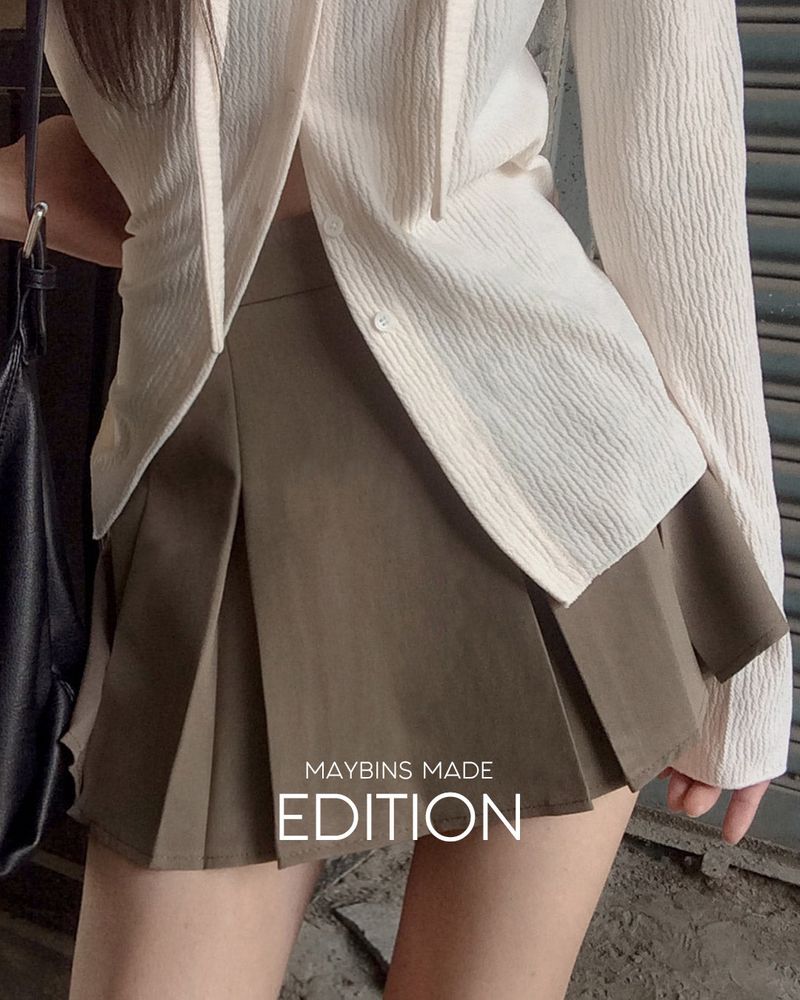 MADE. Rua pleated mini skirt with built-in shorts