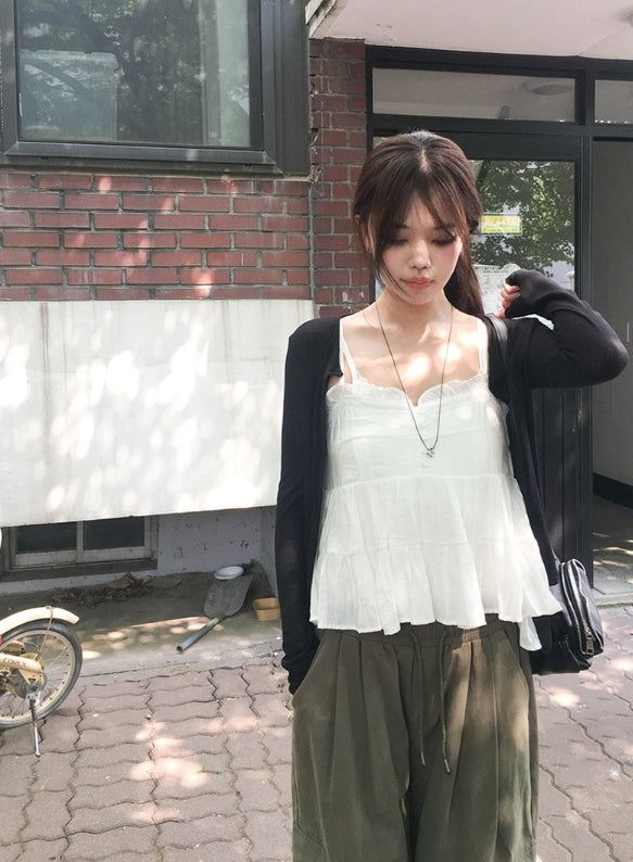 anyonemore（エニーワンモアー）の「Boa See-Through Button Ribbed Long Sleeve Cardigan（Tops）」