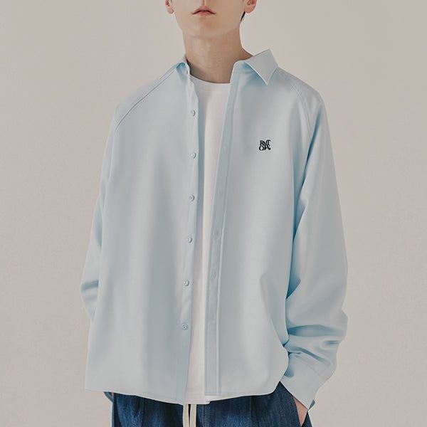 ROMANTIC CROWN(ロマンティッククラウン)の「RAGLAN SLIT SHIRT_SKY BLUE(Tops)」