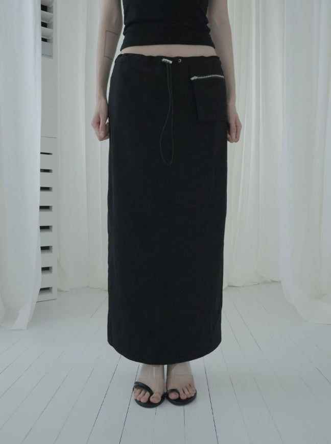 mnem（ムネム）の「Illoque Pocket Nylon Long Skirt（Skirts）」