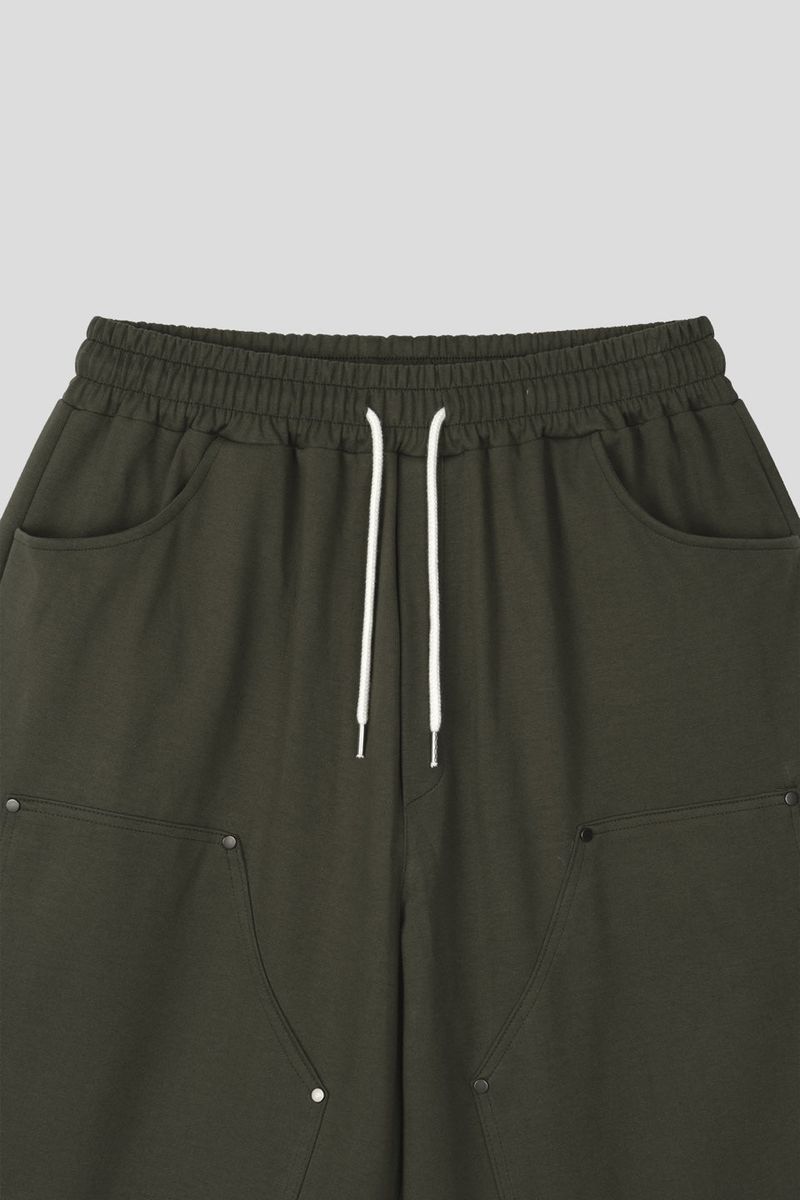 WET DOUBLE KNEE RIVET SWEAT PANTS