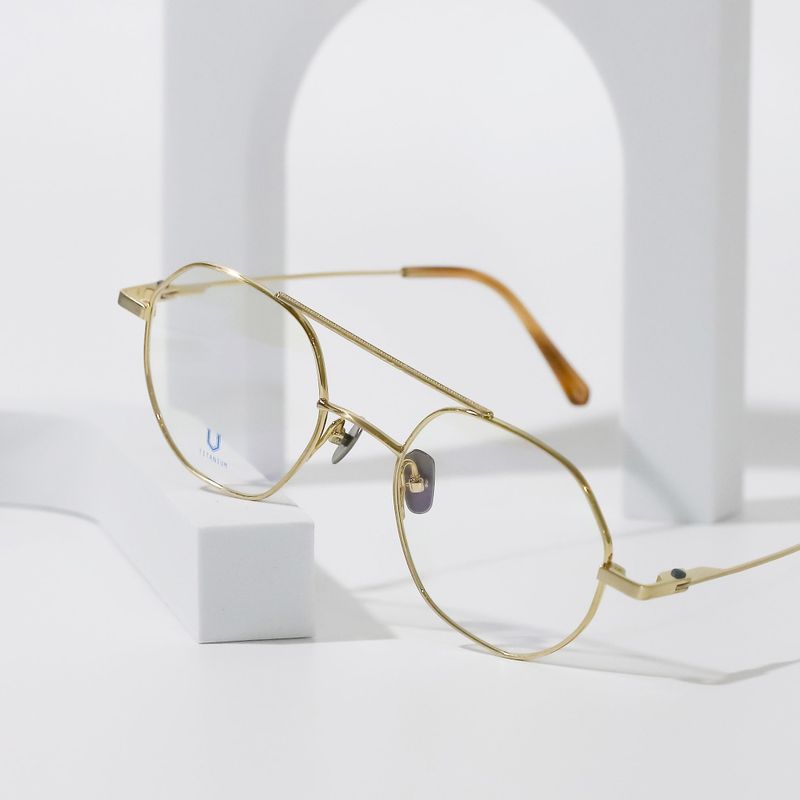 Knouun Round titanium glasses CODE. 103. A Sizzy Gold