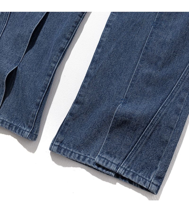 INCISION INVERTED WASHED DENIM PANTS