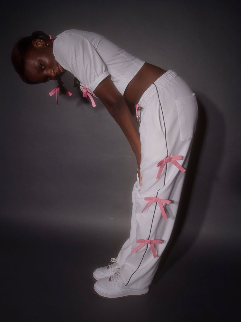 OSHIGH（オスハイ）の「Ribbon Jogger Pants (Pink)（Pants）」
