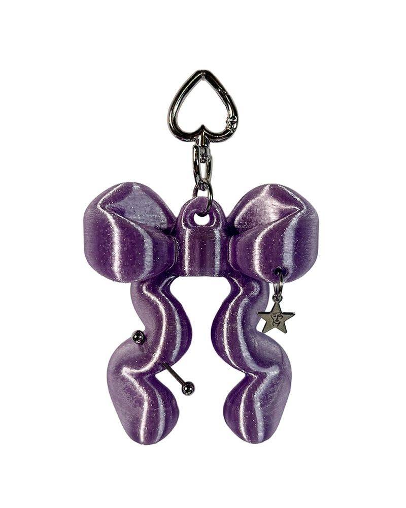 JIMI（ジミ）の「リボンバームキーチェーン - Mystic Purple（アクセサリー）」