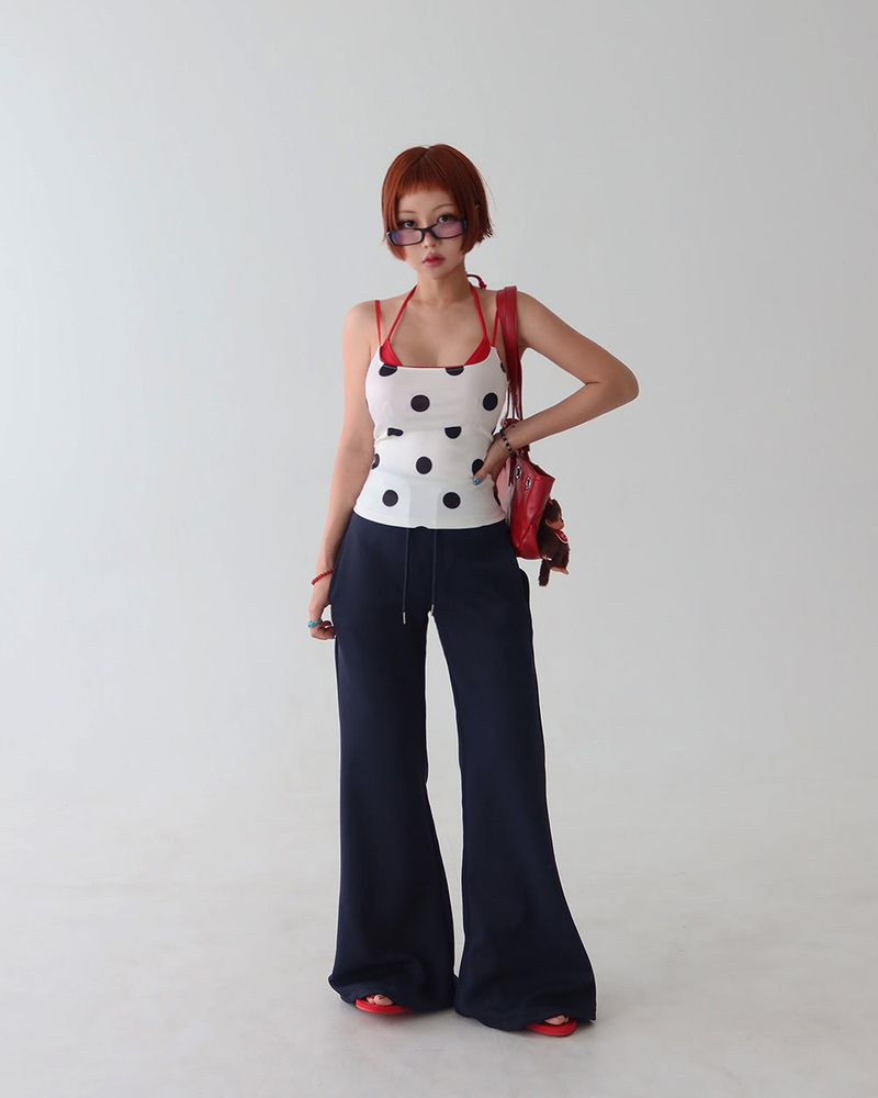 Red colored royal dot sleeveless shirt