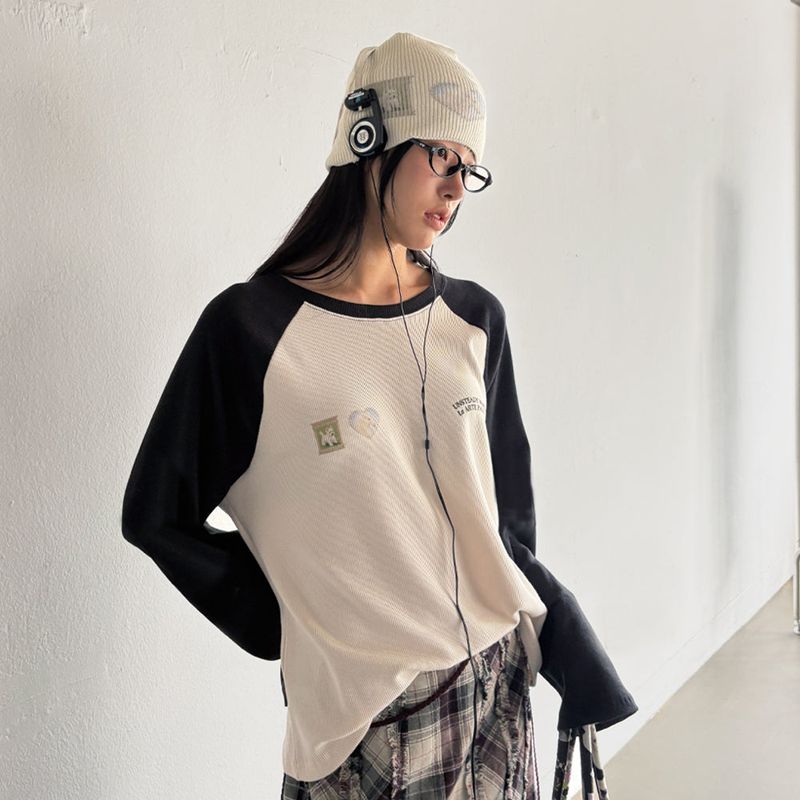 UNSTEADYMARKET(アンステディマーケット)の「ラグランワッフル長袖Tシャツ_ ブラック(トップス)」