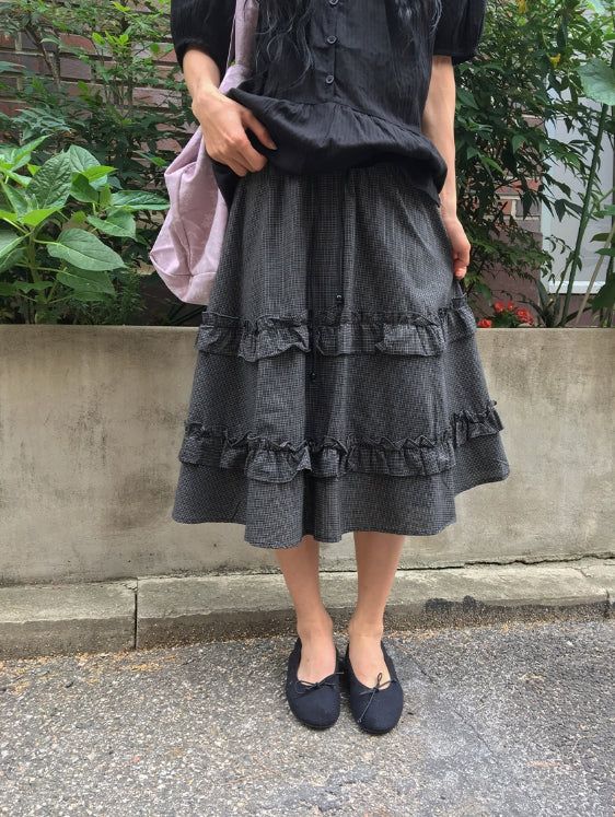 BAON（バオン）の「Chiyo Check Frill Tiered Midi Skirt（Skirts）」