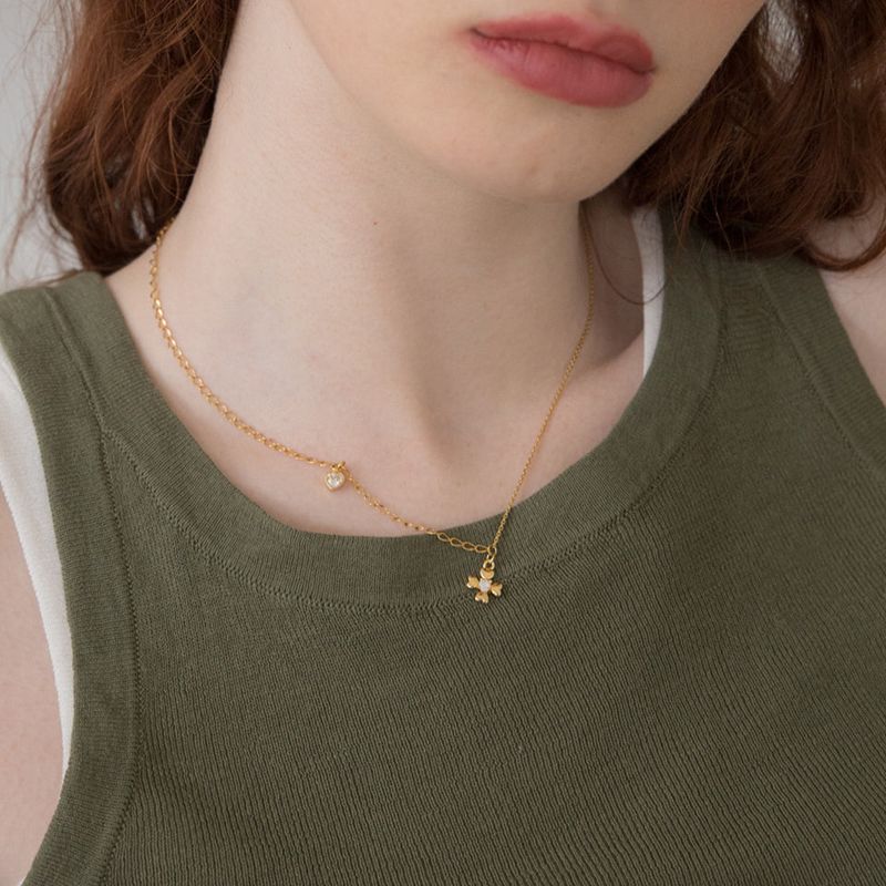 MerryMotive（メリーモチーブ）の「ハートクローバーペンダントサージカルチェーンネックレス（アクセサリー）」