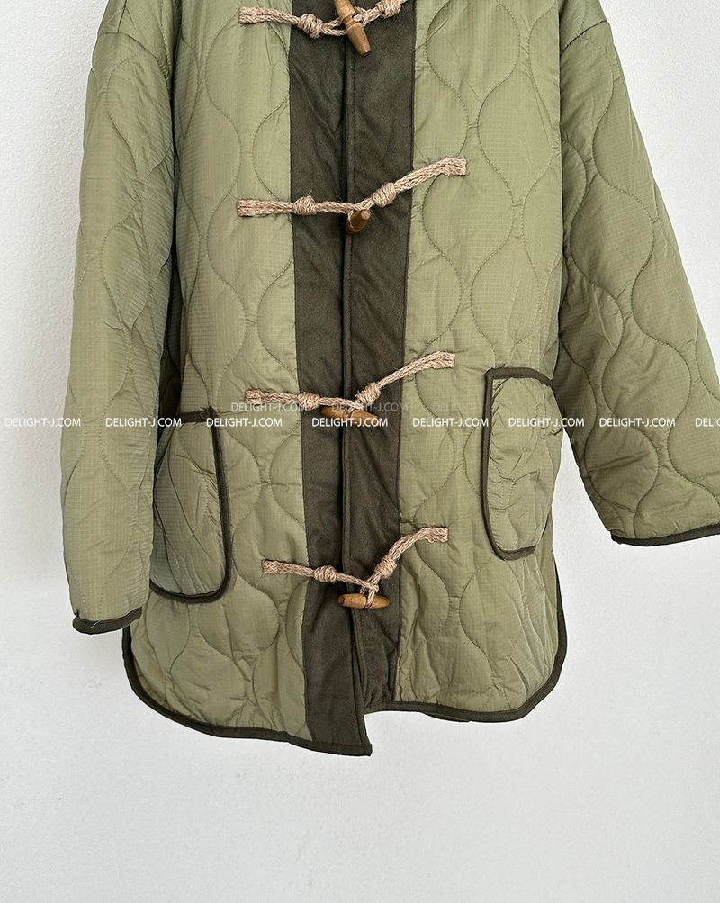 a quilted padded jacket with wool