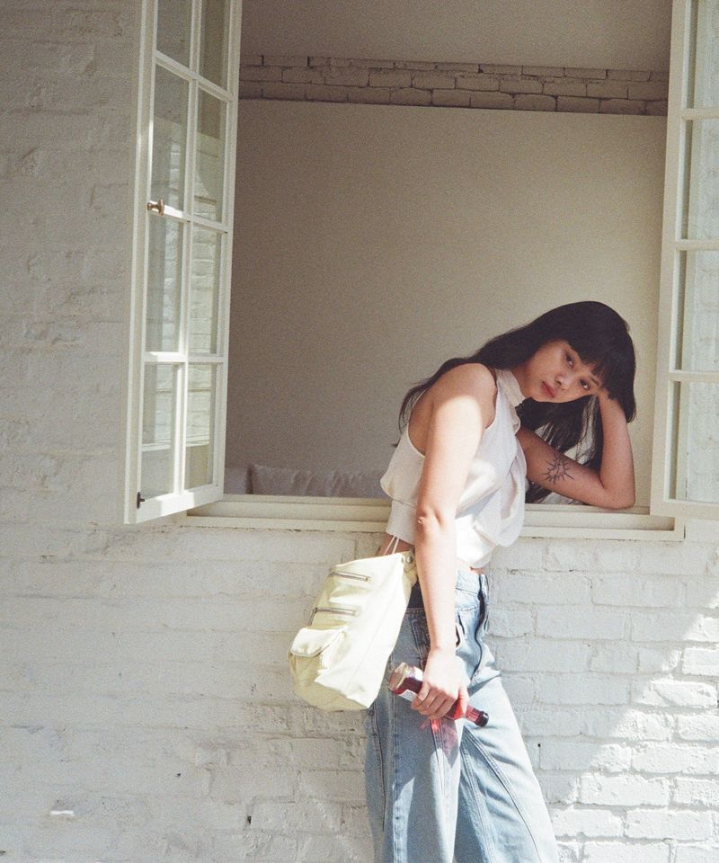 YAHN SISI(ヤーン シシ)の「Pebble Hobo Bag - Butter Yellow(Bags)」