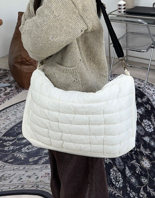 Reven padded crossbody bag