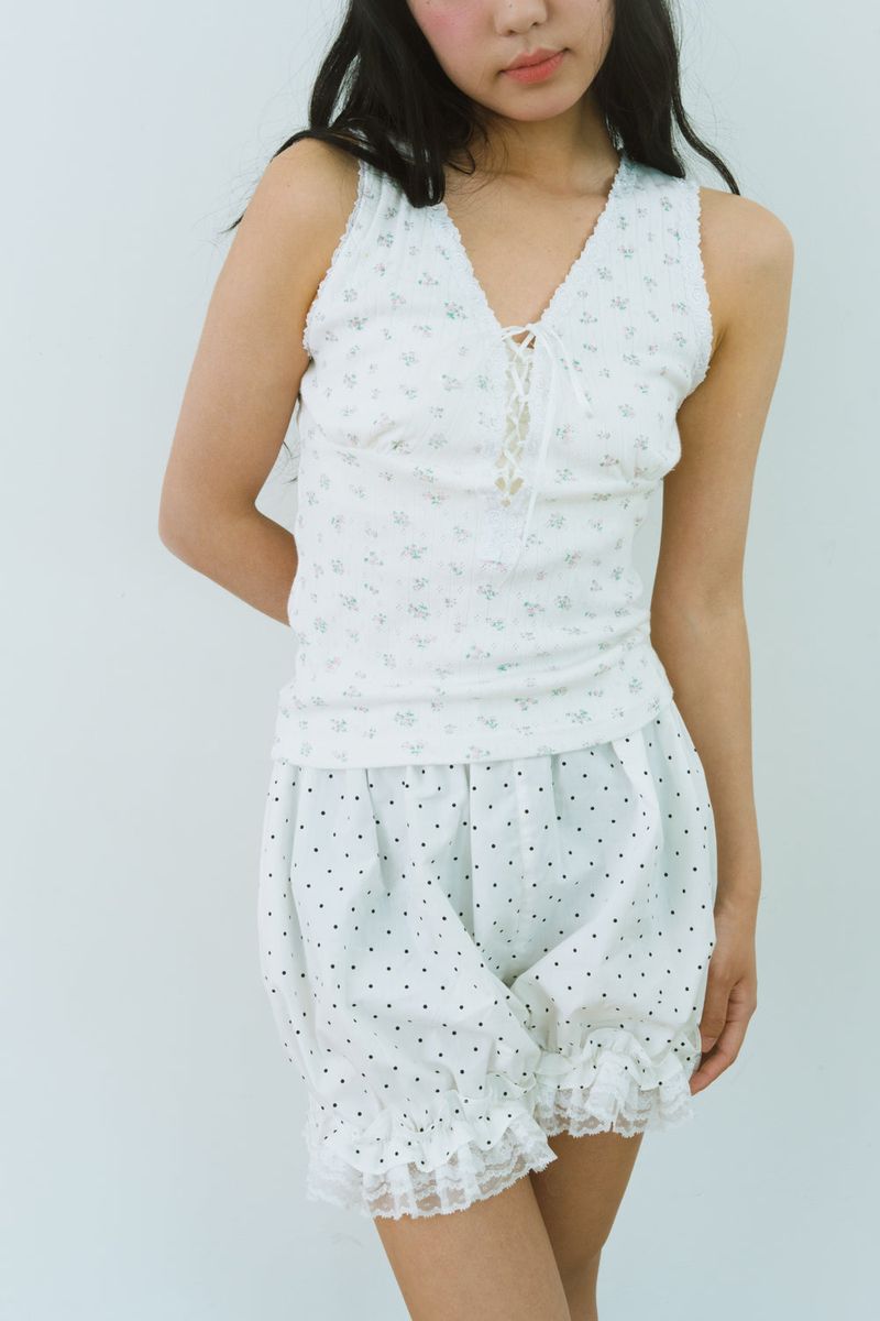 FLOWER EYELET LACE UP TOP