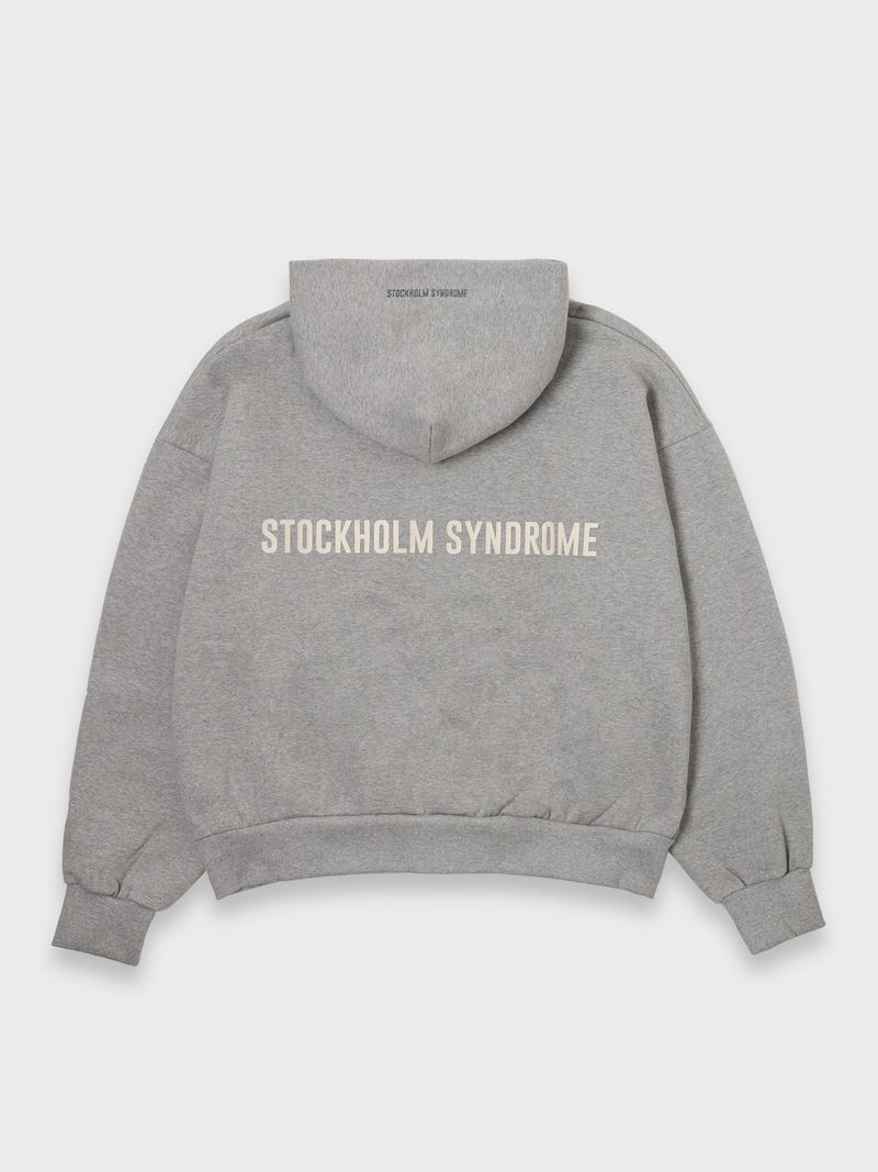 stockholm syndrome（ストックホルムシンドローム）の「LOGO ZIP HOODIE - GREY（Tops）」