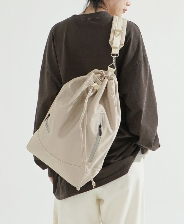 KIXI（キッシー）の「Mini Pouch String Bucket Bag（Bags）」
