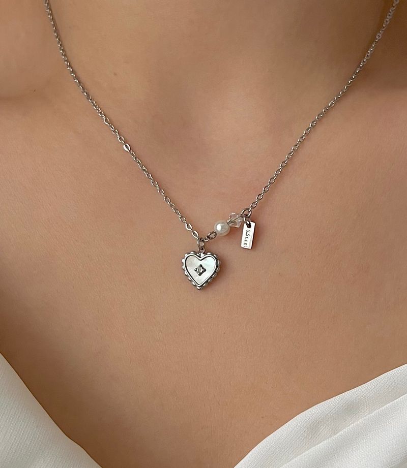 Acer rojo(アセルロジョ)の「jorr innocent mother-of-pearl hearts and beads cubic star wedding look layered necklace(Accessories)」