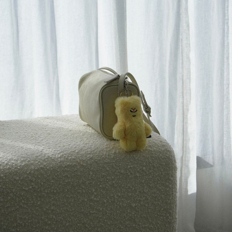 tuteogi yellow doll keyring
