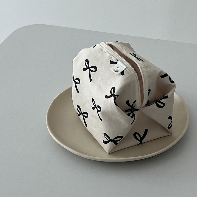 RIBBON ZIPPER POUCH - IVORY